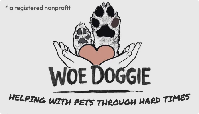 The Woe Doggie business card: two hands holding a heart with dog paws above it, under a hand-lettered wordmark.